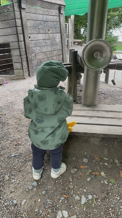 Fleece lined Beanie, rain jacket, green, video on kid wearing the beanie and unlined rain jacket 